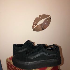 Black platform vans.